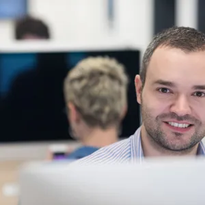 A man smiling at the camera