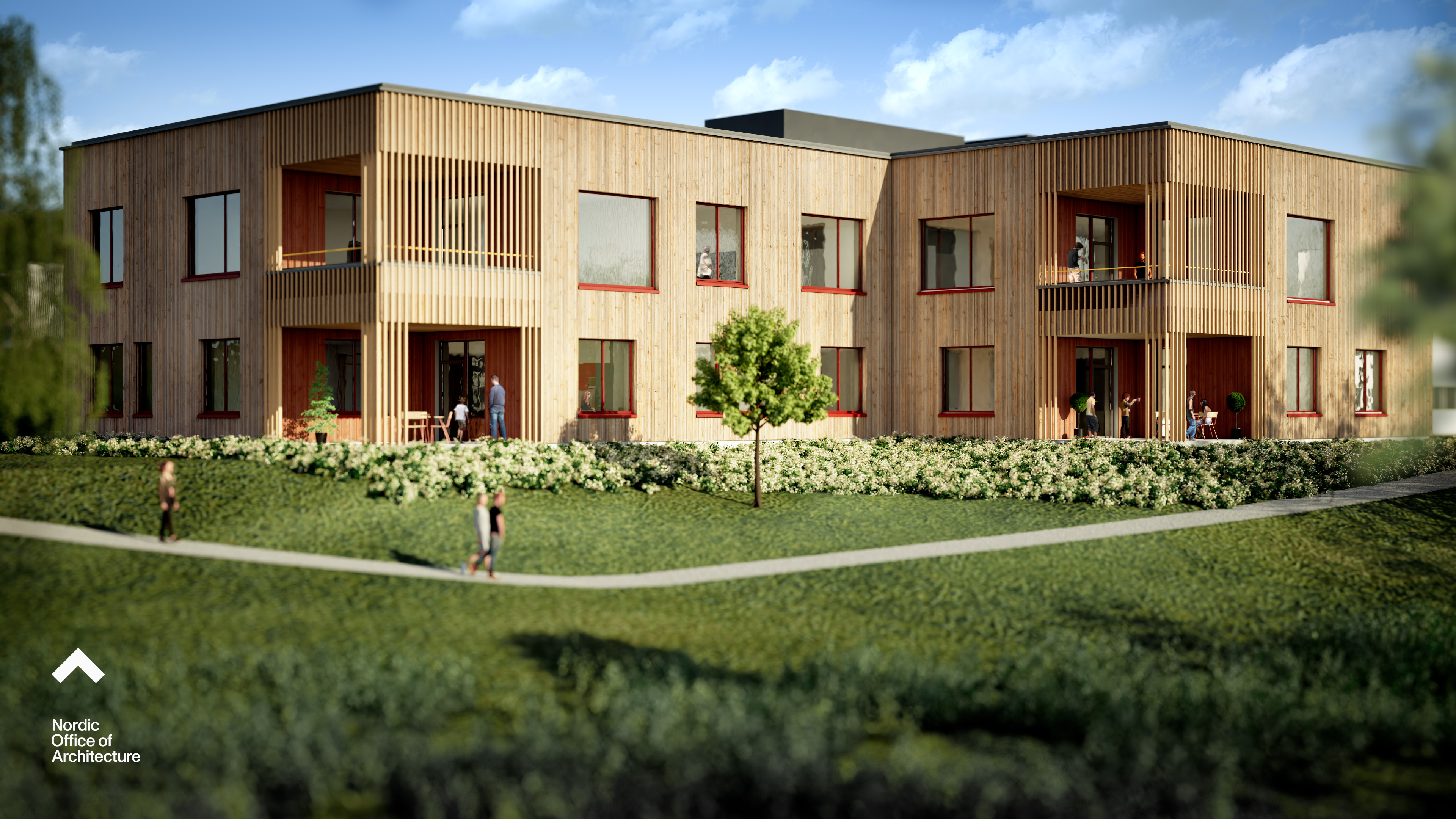 En bygning med en plen foran seg