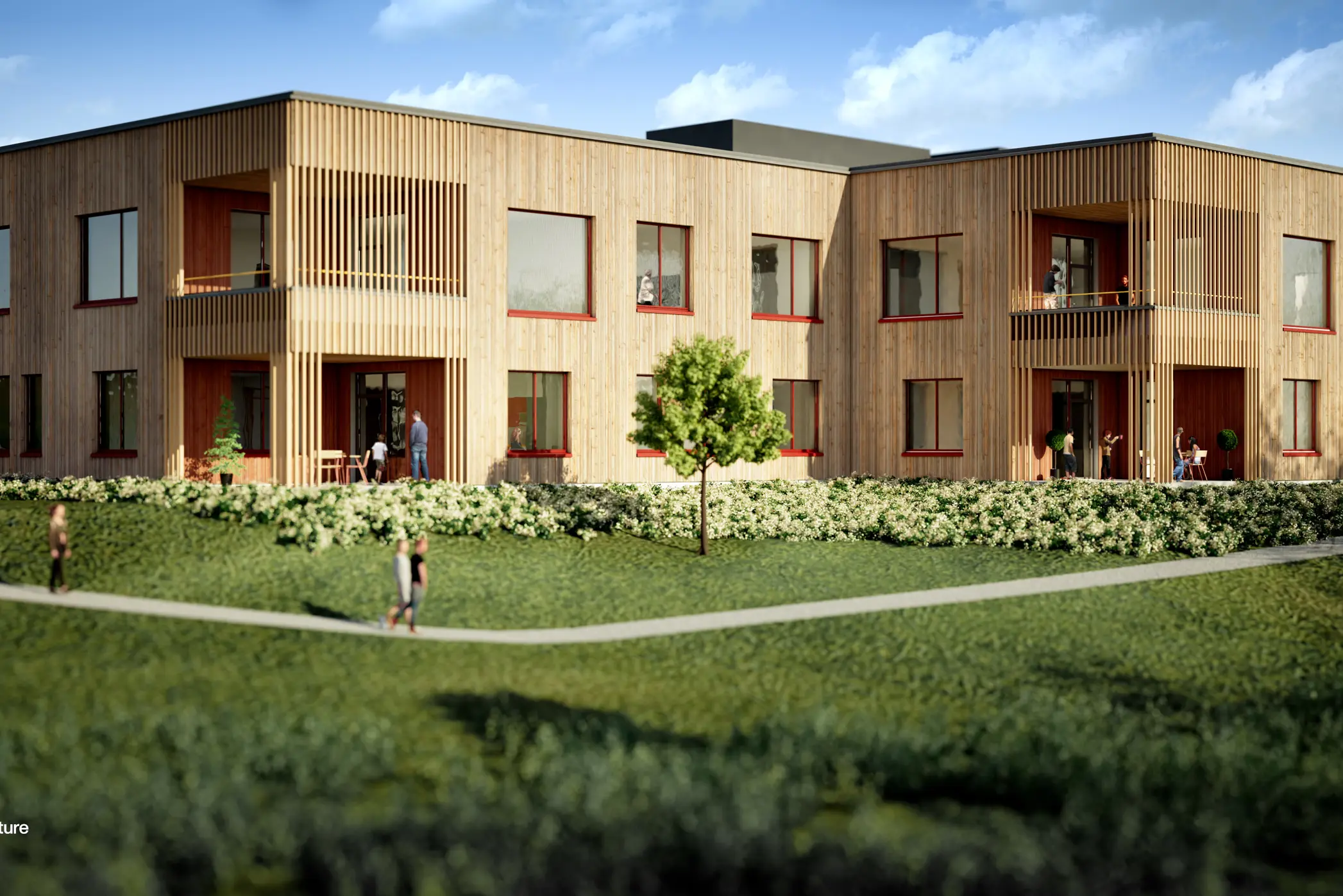 En bygning med en plen foran seg