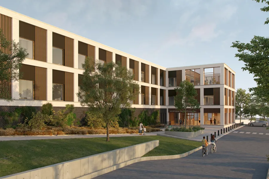 En bygning med gate og trær