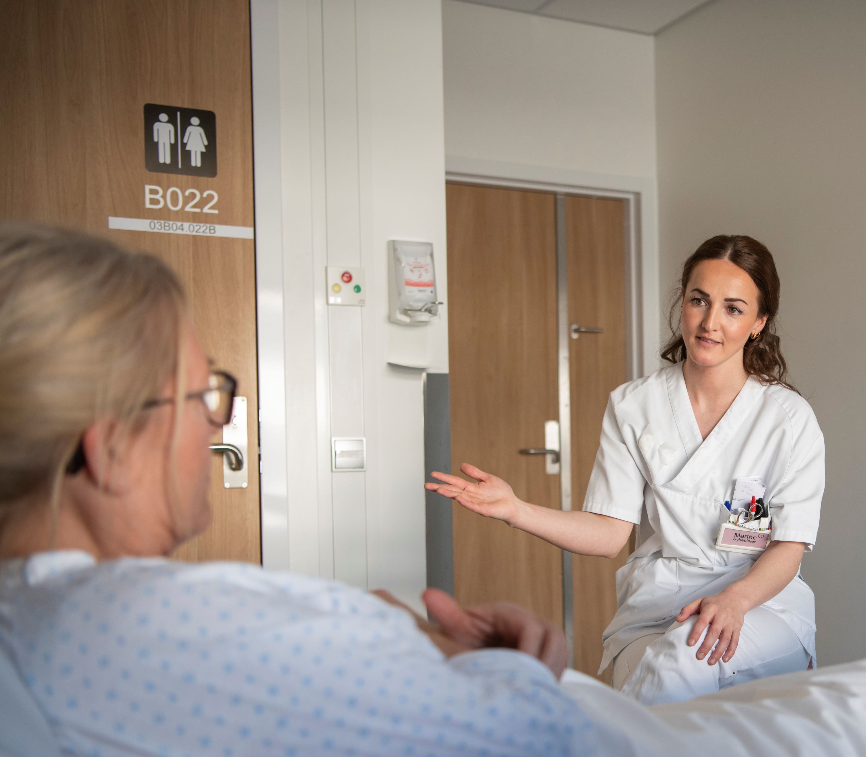A doctor talking to a patient