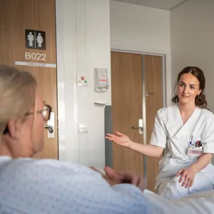 A doctor talking to a patient
